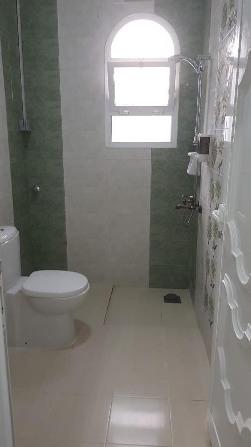 Orient Apartments Низва Екстериор снимка