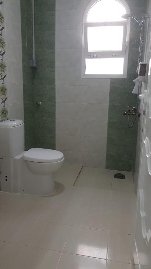 Orient Apartments Низва Екстериор снимка