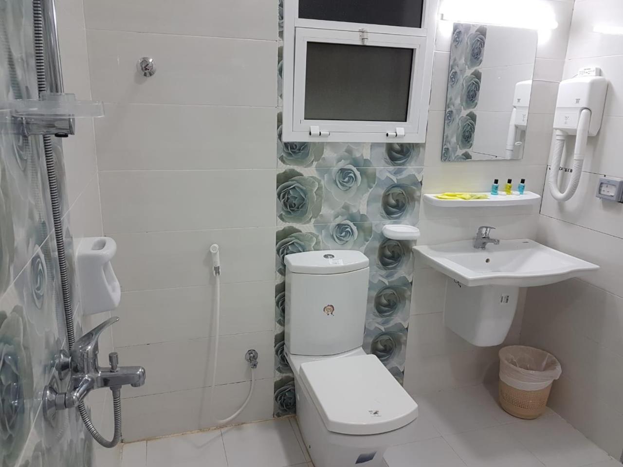 Orient Apartments Низва Екстериор снимка
