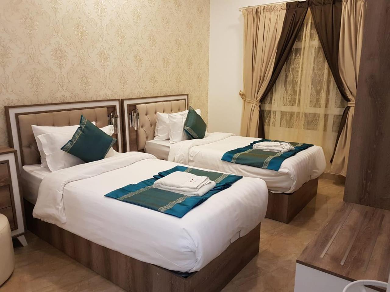Orient Apartments Низва Екстериор снимка