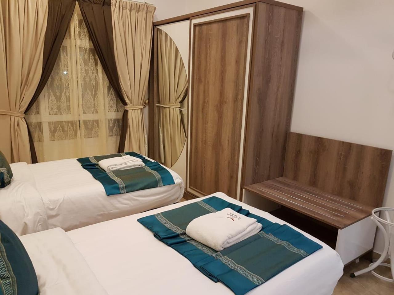 Orient Apartments Низва Екстериор снимка