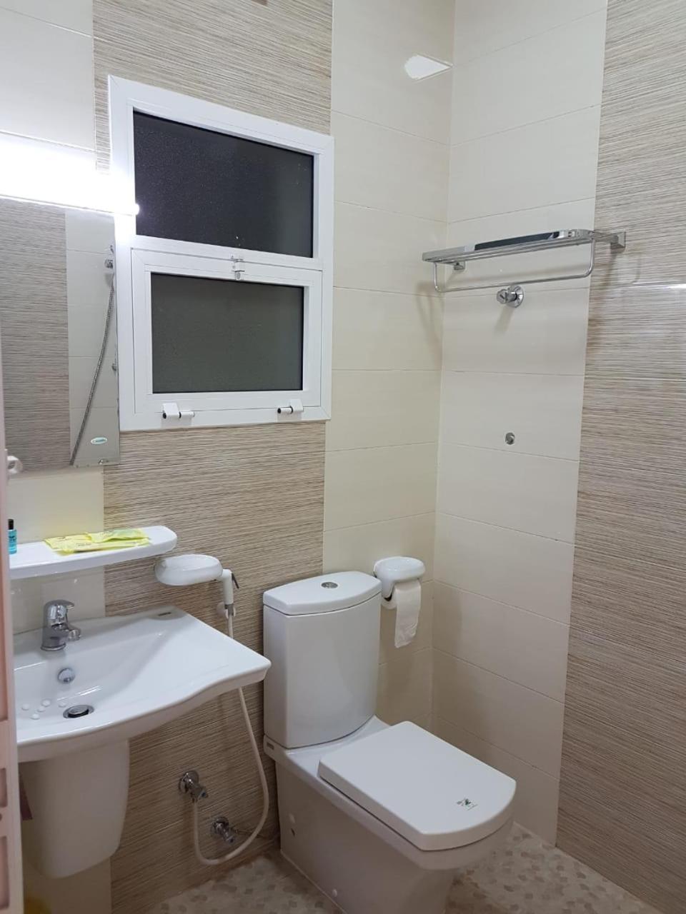 Orient Apartments Низва Екстериор снимка